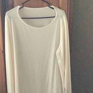 This is Susan Graver liquid knit cream tunic w/ rounded neck and long sleeves.
